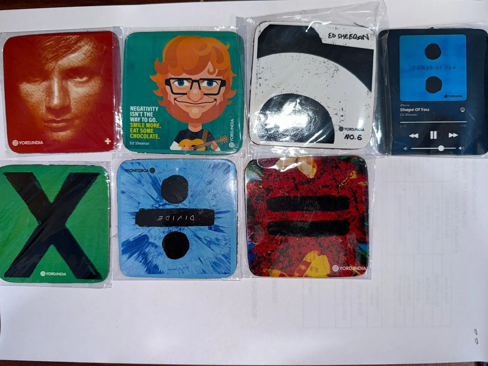 ['Ed Sheeran Album Cover Collection Fridge Magnets - Set of 7 Square Magnets (7x7cm) by YORD (Refrigerator Magnets) - photo 1 of 9', 'Ed Sheeran Album Cover Collection Fridge Magnets - Set of 7 Square Magnets (7x7cm) by YORD (Refrigerator Magnets) - photo 2 of 9', 'Ed Sheeran Album Cover Collection Fridge Magnets - Set of 7 Square Magnets (7x7cm) by YORD (Refrigerator Magnets) - photo 3 of 9', 'Ed Sheeran Album Cover Collection Fridge Magnets - Set of 7 Square Magnets (7x7cm) by YORD (Refrigerator Magnets) 