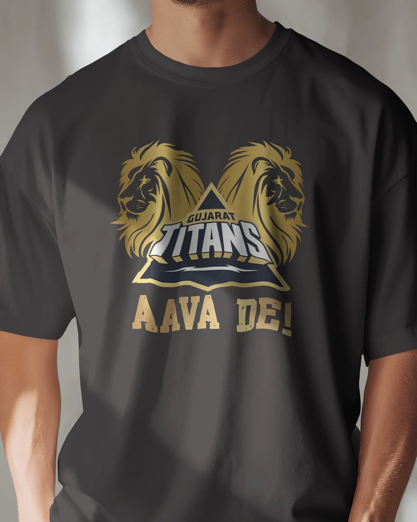 ['Premium Gujarat Titans Oversized IPL T-shirt - AAVA DE! by YORD (T-Shirts) - photo 1 of 5', 'Premium Gujarat Titans Oversized IPL T-shirt - AAVA DE! by YORD (T-Shirts) - photo 2 of 5', 'Premium Gujarat Titans Oversized IPL T-shirt - AAVA DE! by YORD (T-Shirts) - photo 3 of 5', 'Premium Gujarat Titans Oversized IPL T-shirt - AAVA DE! by YORD (T-Shirts) - photo 4 of 5', 'Premium Gujarat Titans Oversized IPL T-shirt - AAVA DE! by YORD (T-Shirts) - photo 5 of 5']