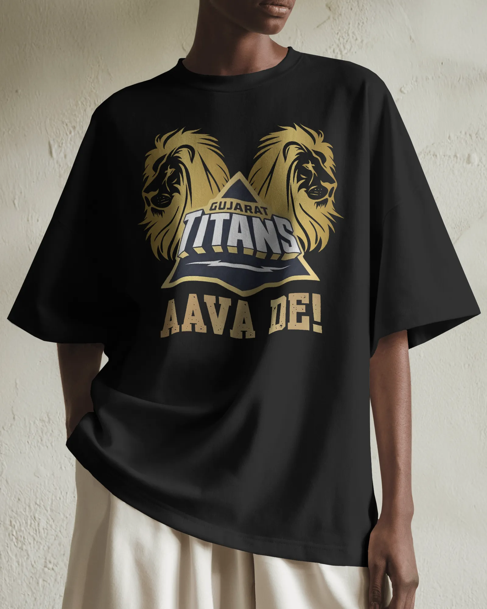 ['Premium Gujarat Titans Oversized IPL T-shirt - AAVA DE! by YORD (T-Shirts) - photo 1 of 5', 'Premium Gujarat Titans Oversized IPL T-shirt - AAVA DE! by YORD (T-Shirts) - photo 2 of 5', 'Premium Gujarat Titans Oversized IPL T-shirt - AAVA DE! by YORD (T-Shirts) - photo 3 of 5', 'Premium Gujarat Titans Oversized IPL T-shirt - AAVA DE! by YORD (T-Shirts) - photo 4 of 5', 'Premium Gujarat Titans Oversized IPL T-shirt - AAVA DE! by YORD (T-Shirts) - photo 5 of 5']